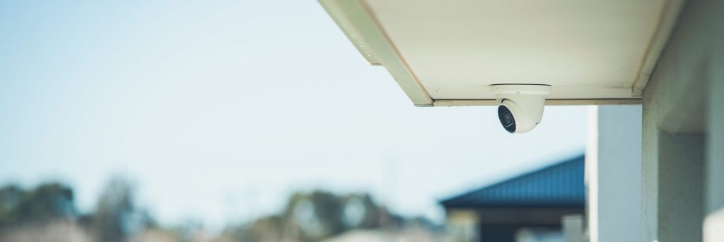 CCTV camera on eaves of a house